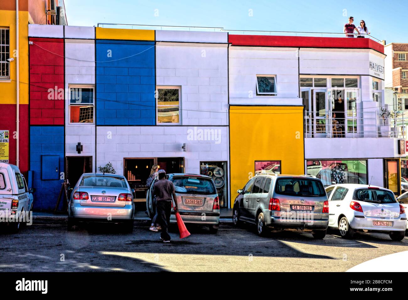 Block Coloured Building On Wale Street Bo Kaap With The Harvest Cafe