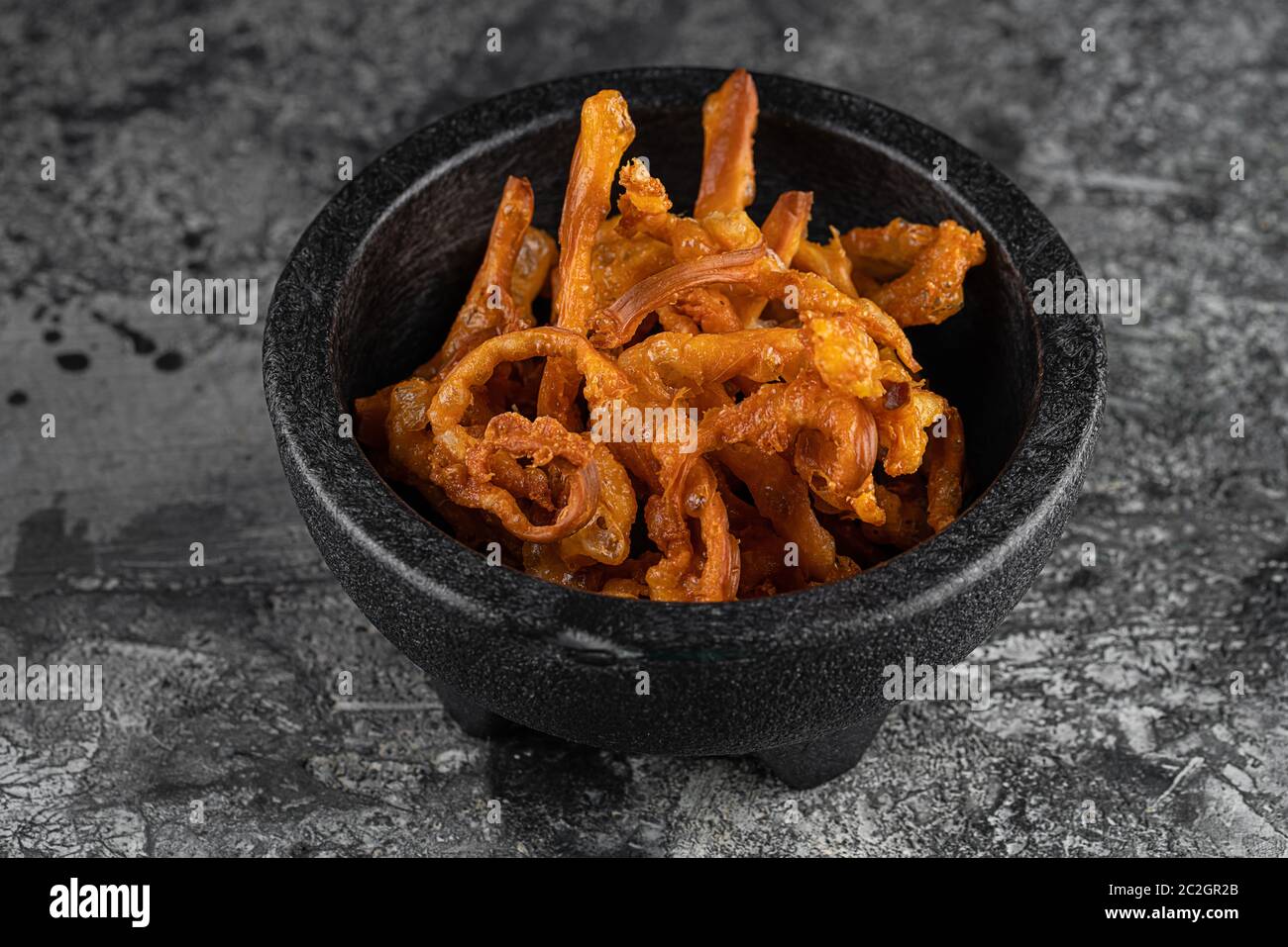 deep fried suluguni cheese on black background Stock Photo - Alamy