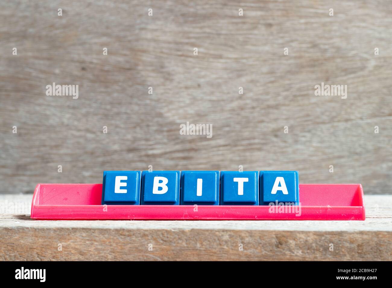Tile Letter On Red Rack In Word Ebita Abbreviation Of Earnings Before Interest Taxes And 9753