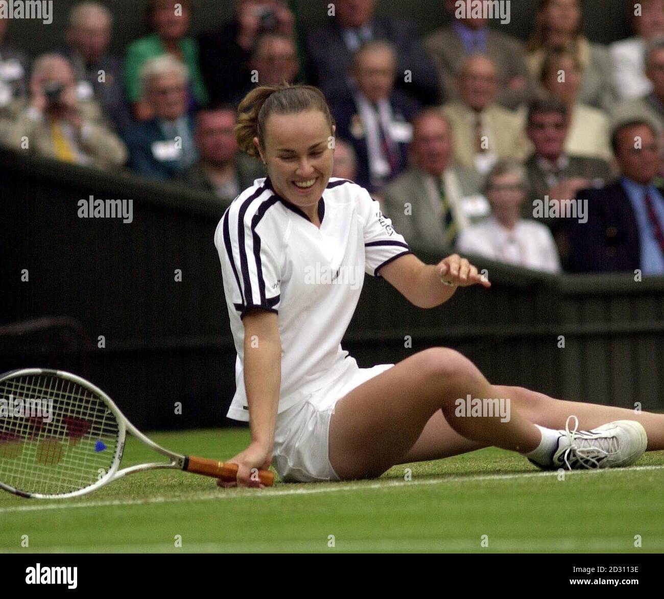 NO COMMERCIAL USE: Switzerland's Martina Hingis smiles after falling ...
