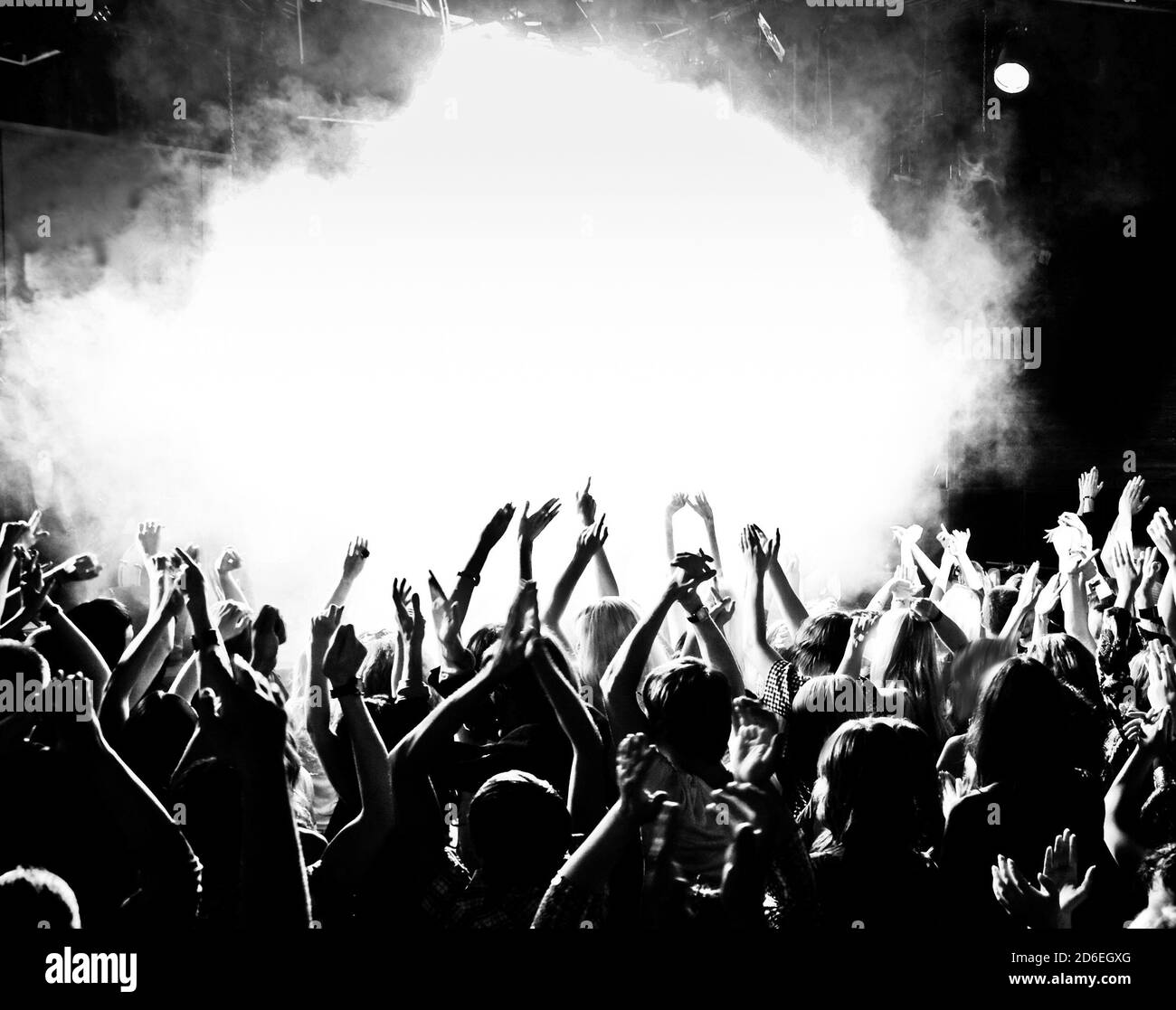 Concert crowd, hands up, toned Stock Photo - Alamy