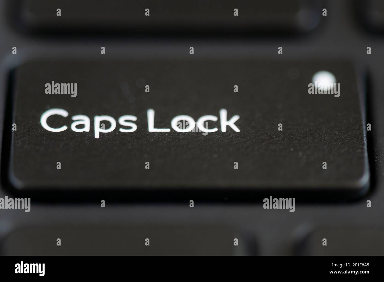 Caps Lock key on a laptop keyboard Stock Photo Alamy