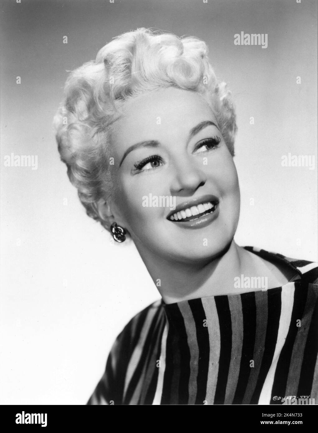 BETTY GRABLE Portrait publicity for THREE FOR THE SHOW 1955 director H ...