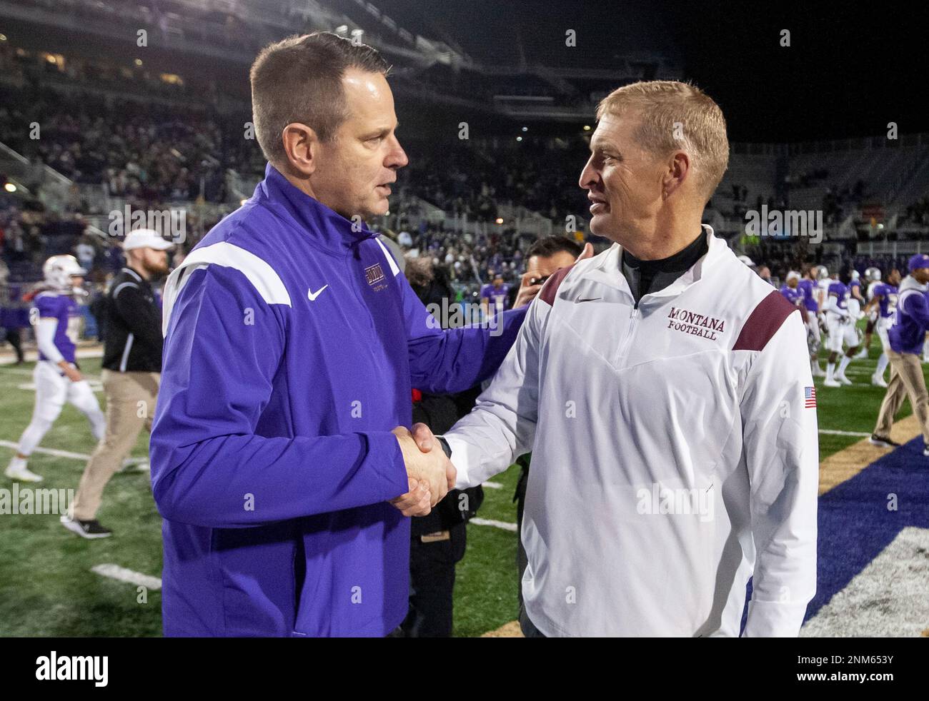 James Madison Coach Curt Cignetti Left Shakes Hands With Montana Coach Bobby Hauck After An 1551