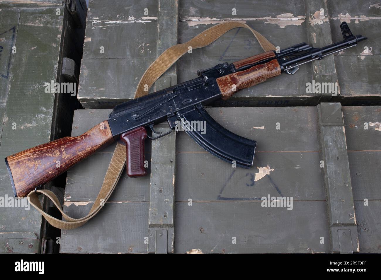 Kalashnikov AK47 gun on army green wooden crates Stock Photo - Alamy