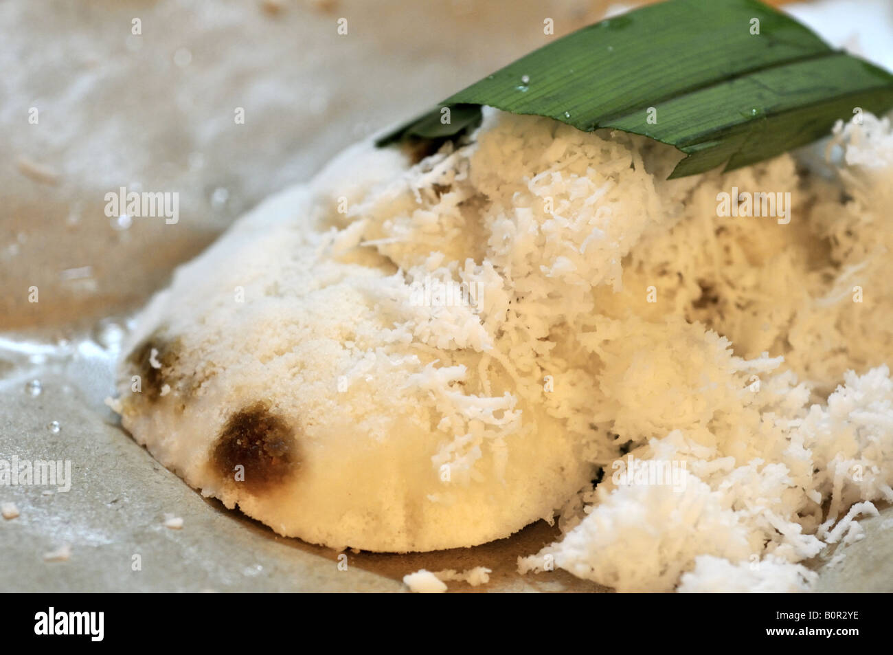 Putu Piring Malay Sweet Of Steamed Rice Flour Cakes Filled With Palm Sugar And Topped With 9652