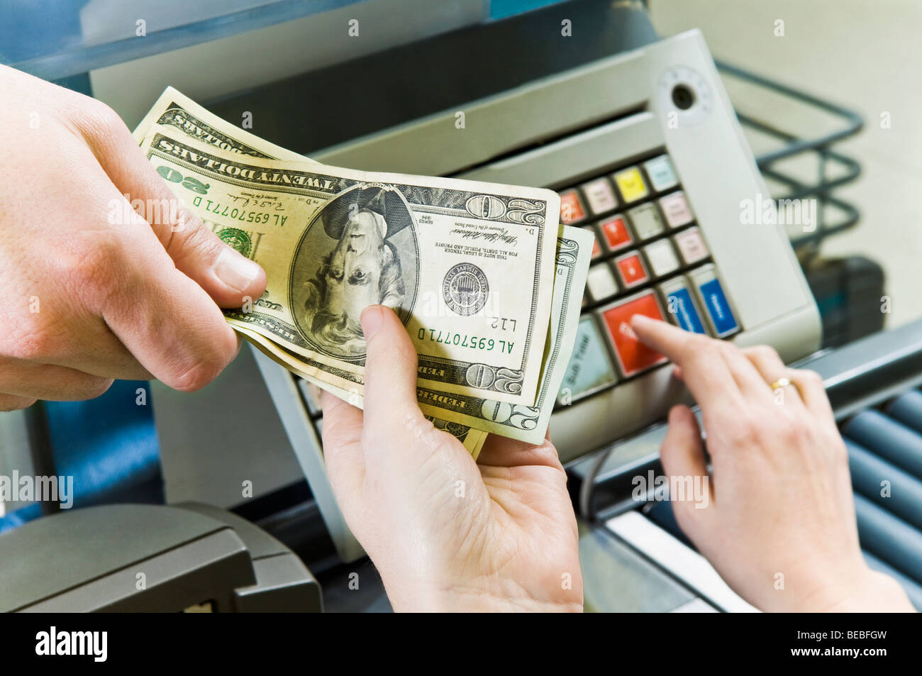 customer-paying-to-cashier-stock-photo-alamy