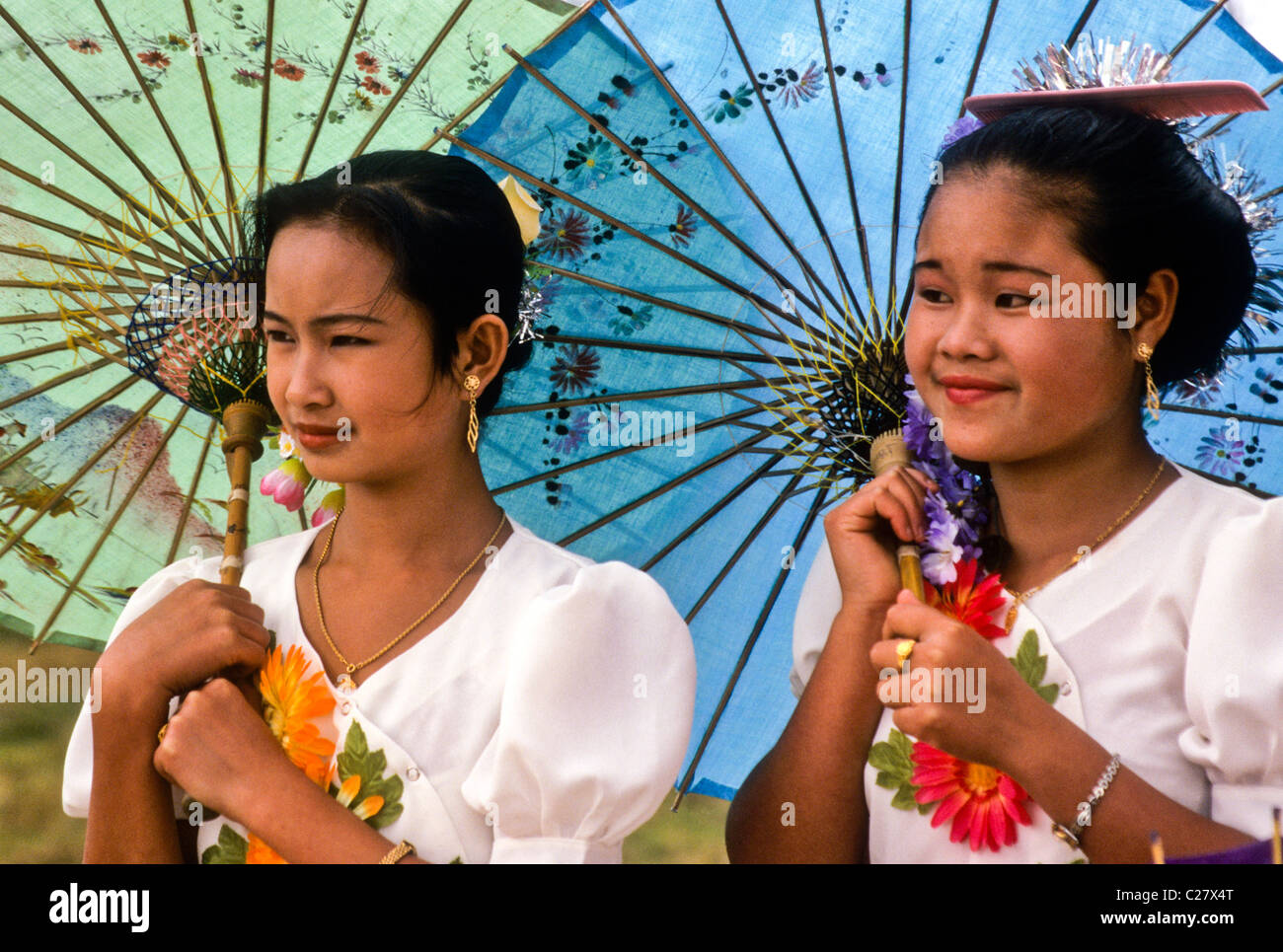 Dai girls in festival dress, Xishuangbanna, Yunnan, China Stock Photo ...