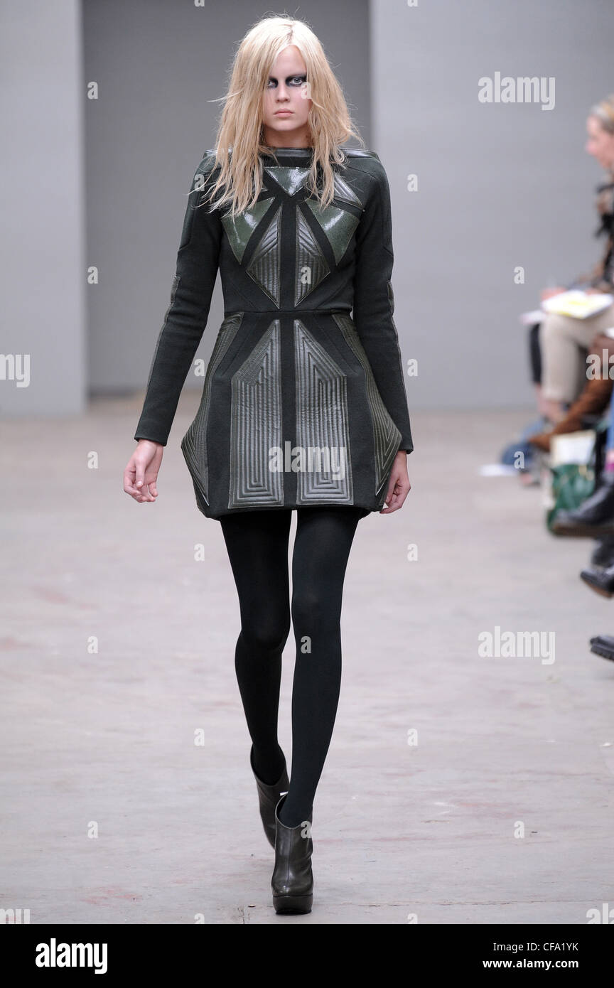Textured short grey dress with geometric pattern, black tights and ...