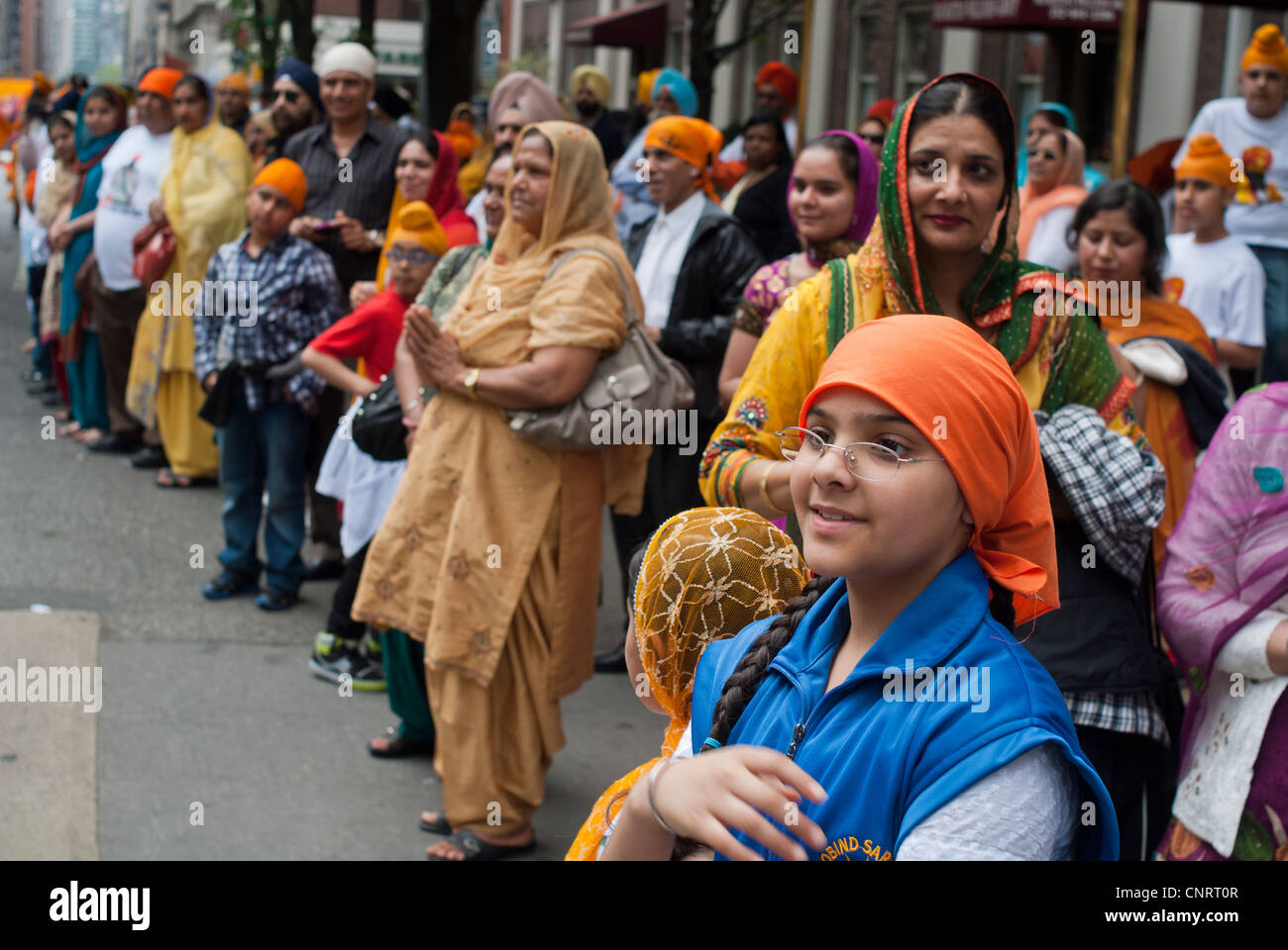 Thousands watch and participate in the 25th Annual Sikh Day Parade in