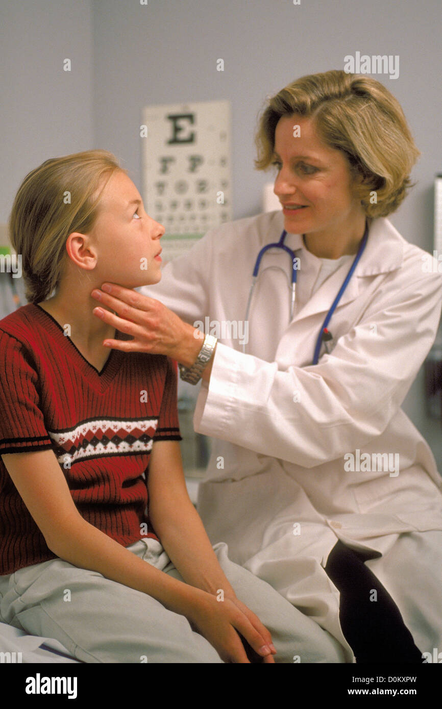 Pediatrician Feels Patients Lymph Nodes Stock Photo Alamy