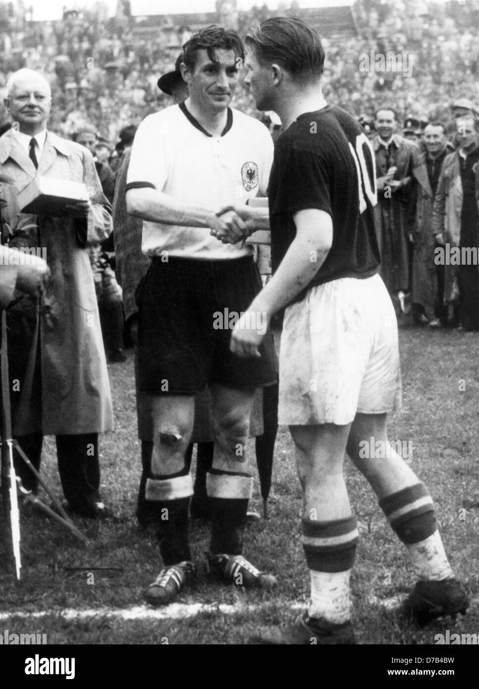 Hungarian Team Captain Ferenc Puskas R Congratulates German Captain Fritz Walter L On The 7580