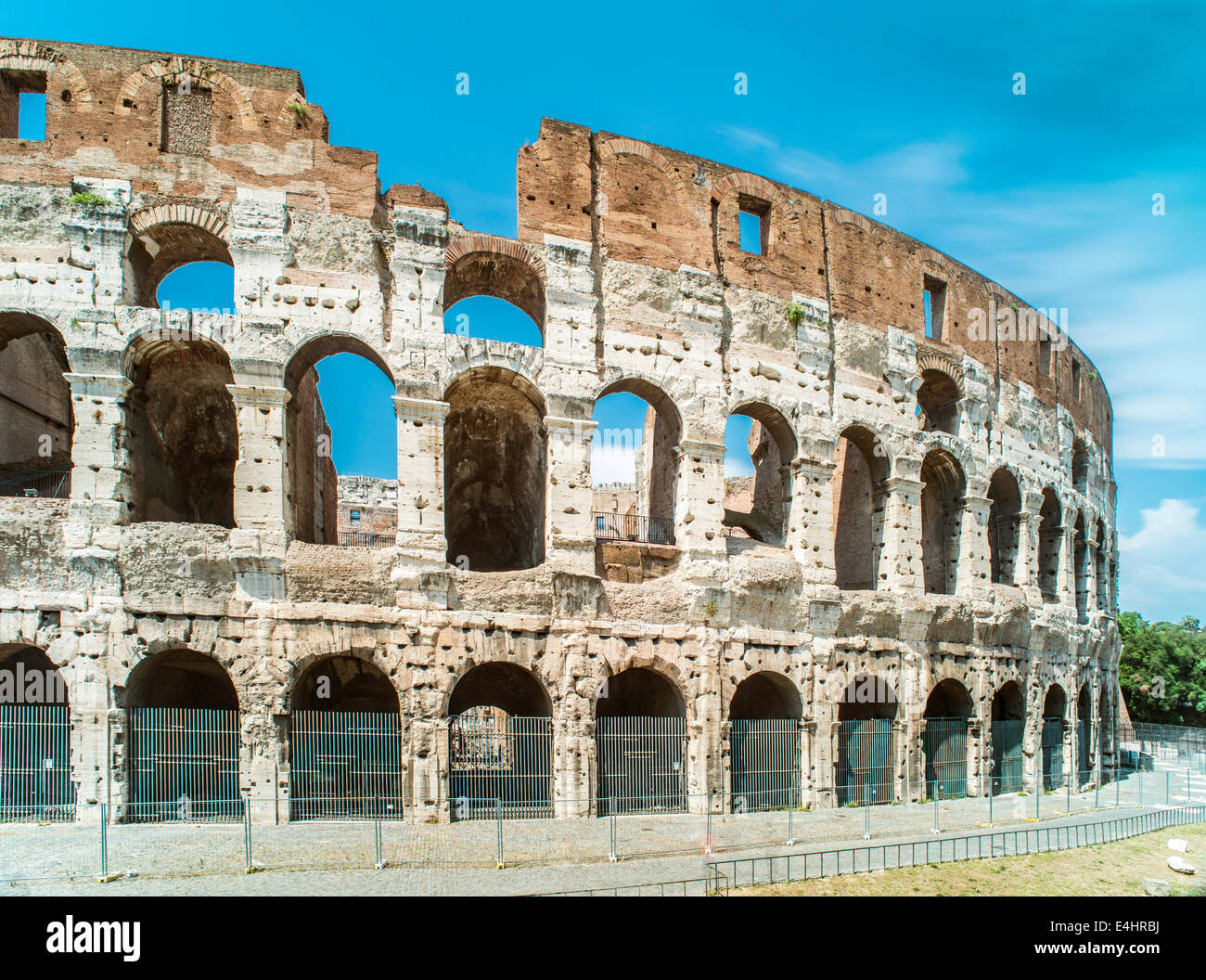 The Colosseum in Rome. Blue sky Stock Photo - Alamy