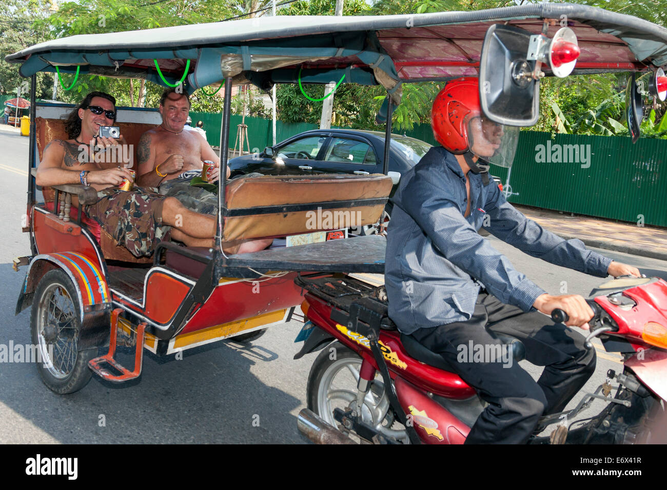Tourists in a Tuk Tuk, Phnom Penh, Cambodia Stock Photo - Alamy