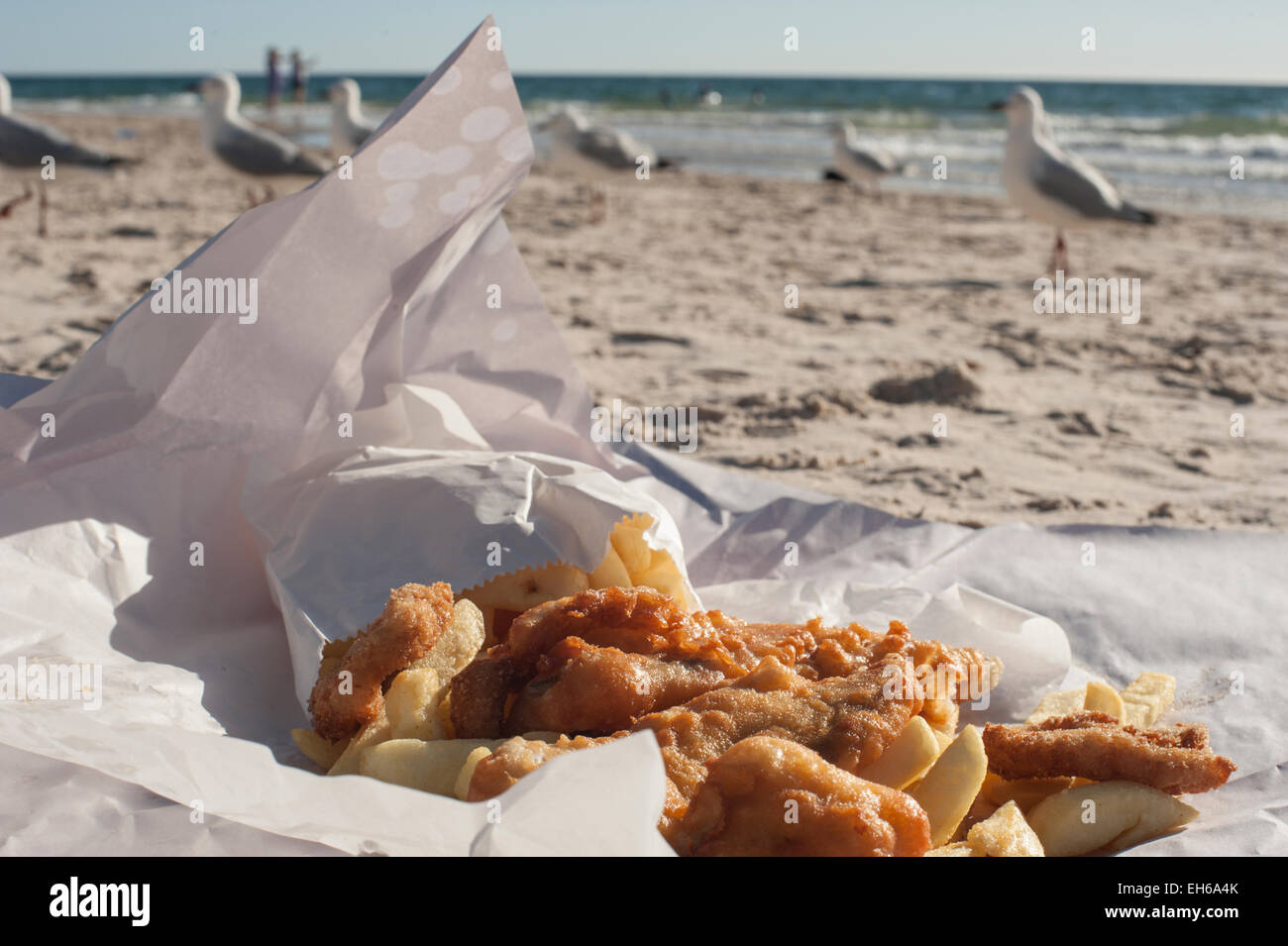 Fish and Chips on the beach in Adelaide, South Australia, with seagulls