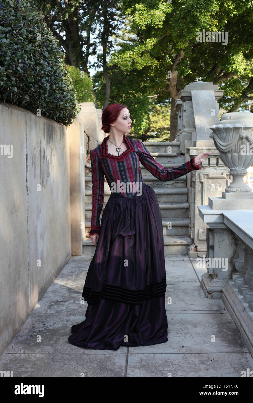 Portrait Of A Beautiful Red Haired Girl Wearing Gothic Inspired Victorian Era Clothes Vampire 5643