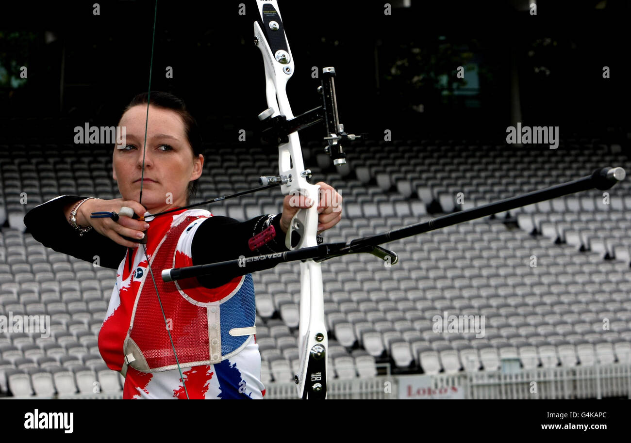 Great Britains Archer Amy Oliver Poses During At A Photocall On Day One Of The London Olympic 3356