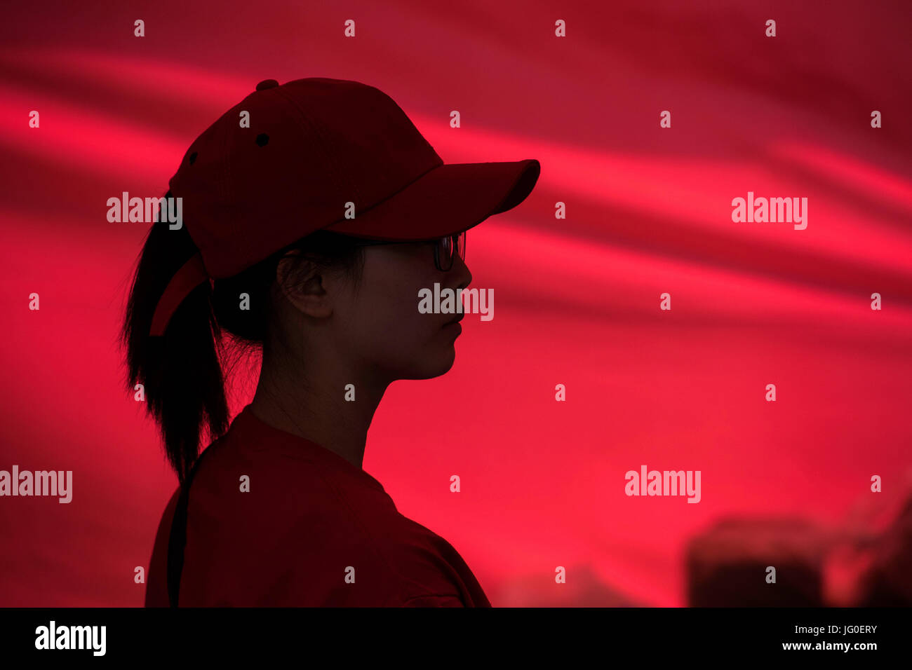 Silhouette of a young Asian fast food worker Stock Photo - Alamy