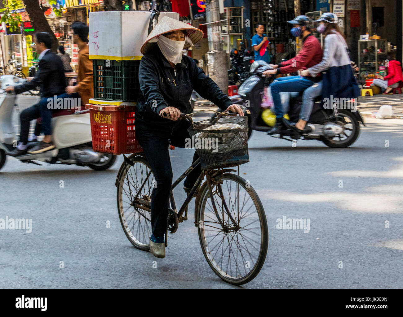 Life on streets of Hanoi Vietnam Stock Photo - Alamy