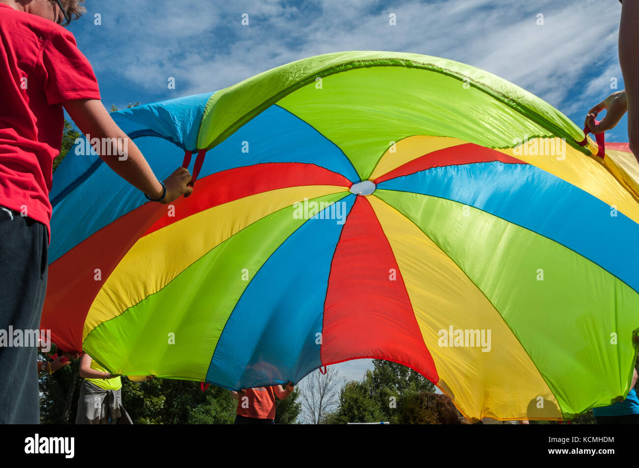 Parachute umbrella game Stock Photo Alamy