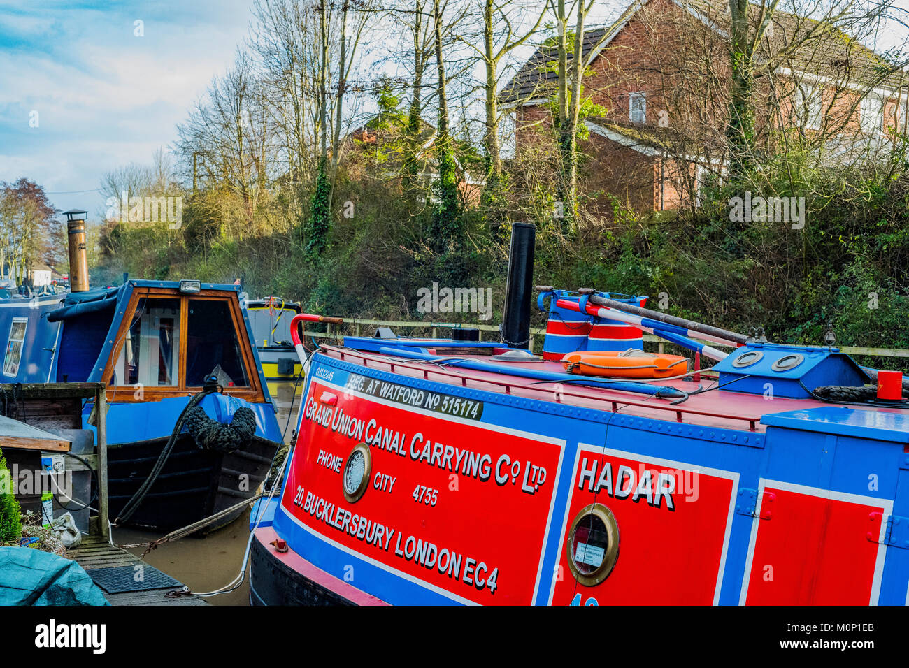 canal river in the english countryside bugbrooke, wharf, marina