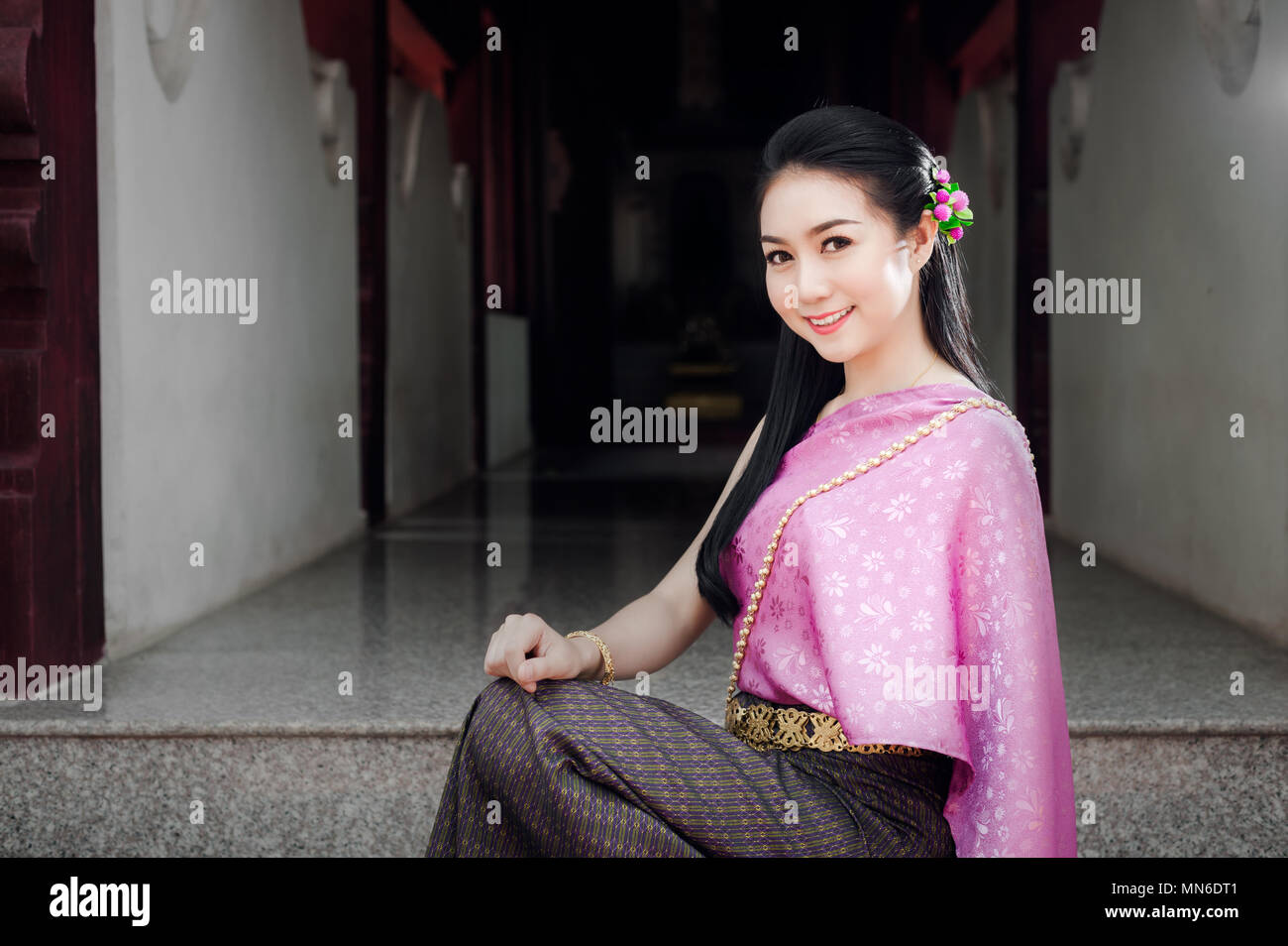 Portrait of beautiful Thai woman in Thai national dress sitting in ...