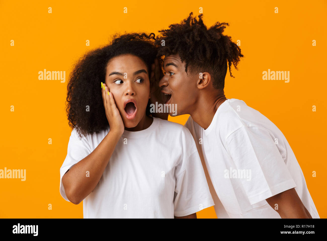 Image Of Emotional Young Cute African Couple Posing Isolated Over