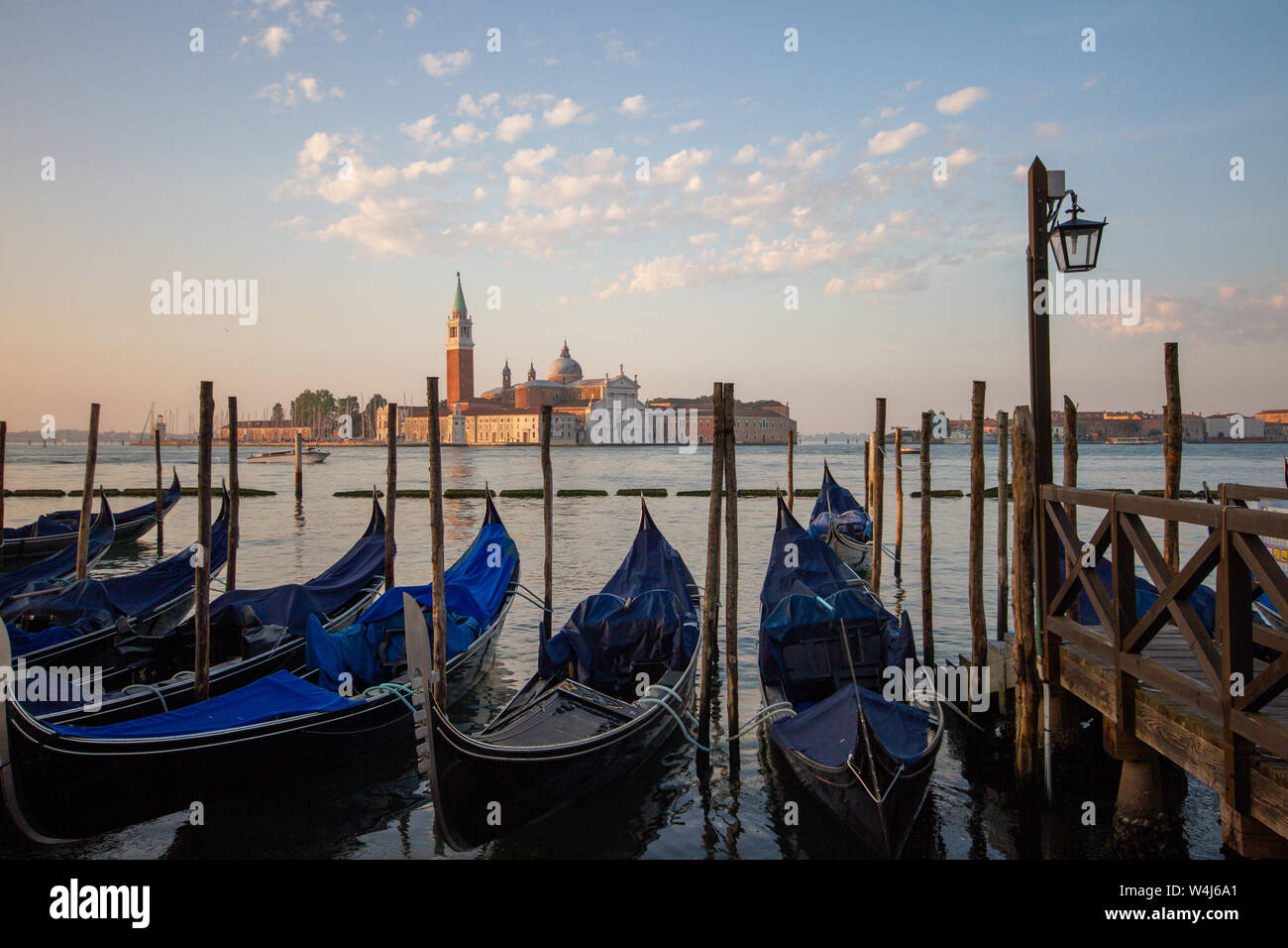 view of Giudecca island and gondolas on Venice canals Stock Photo - Alamy